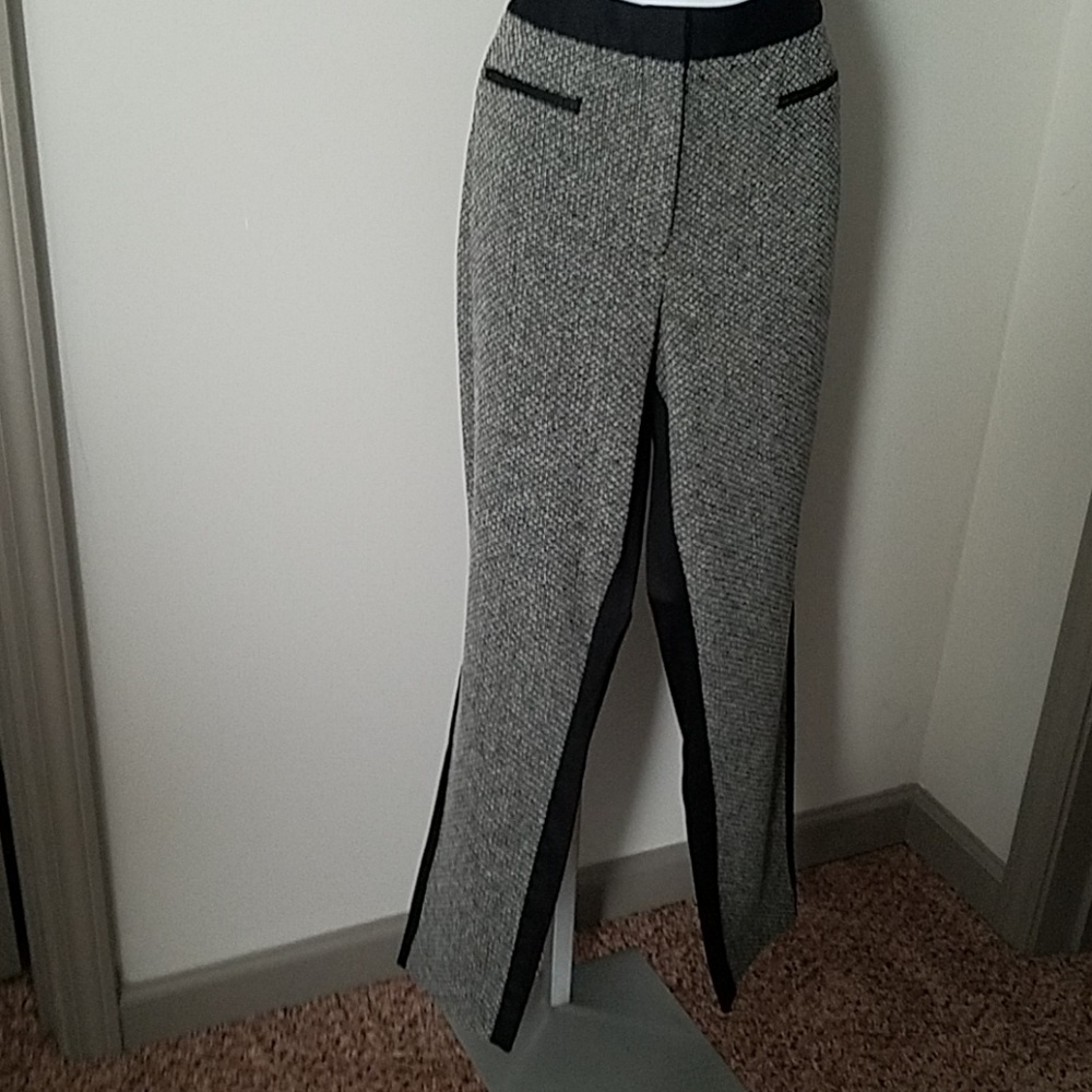 Mixed media black and white pants.